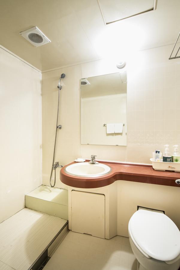 Twins Hotel Чеджу Екстериор снимка